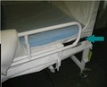 Figure 1: Additional shim bar with black end is part of the retrofit kit and is added to the existing rail. It keeps canopy tight against the mattress. This bar will not be present if you don't have the kit.