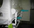 Figure 2: End rail is other part of retrofit kit and is the structure with cylindrical upholstered cover, and brackets. This end rail keeps canopy tight against the mattress and will not be present if you don't have the kit.