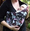 Keep the infant's head above the sling and away from the caregiver's body
