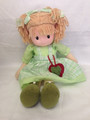 Doll with green-white dress
