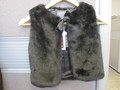 Grande Fille brand girl's faux-fur vest with a neck drawstring sold at L'Aubainerie