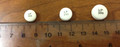 Tridural marked tablets showing 3 white tablets with a ruler placed under them. From the left, the first tablet is labelled LP 100; the second tablet is labelled LP 200; the third is marked LP 300.
