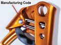 Manufacturing code located inside the ascender next to the toothed cam