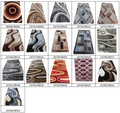 Various area rugs in sizes 1.6m by 2.3m and 2m by 3m