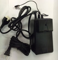 Power supply with cover attached