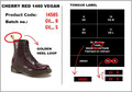 Dr. Martens 1460 Vegan Cherry Red 8-eye boot and label