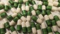 Le produit « Multi-Vitamines » vendu en vrac (capsules vertes et blanches)