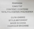 Inside label with style number. 