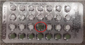 Mirvala 28 - Incorrect packaging (1 green placebo pill [circled in red] in place of a white active pill)